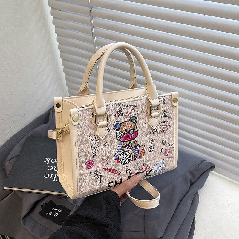 Imported Designer Crossbody Handbag with Graffiti Accent