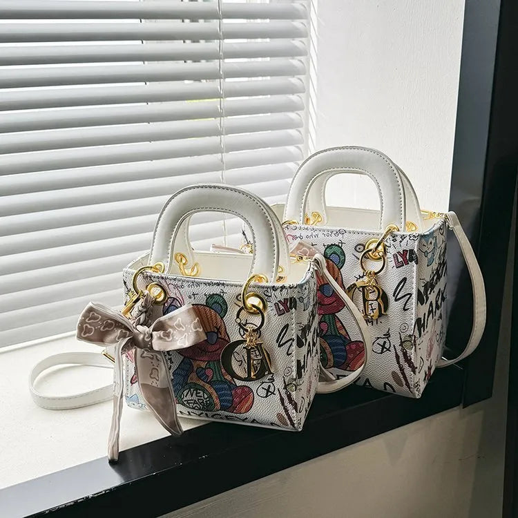 Imported Designer Crossbody Handbag with Graffiti Accent With Silk Scarf