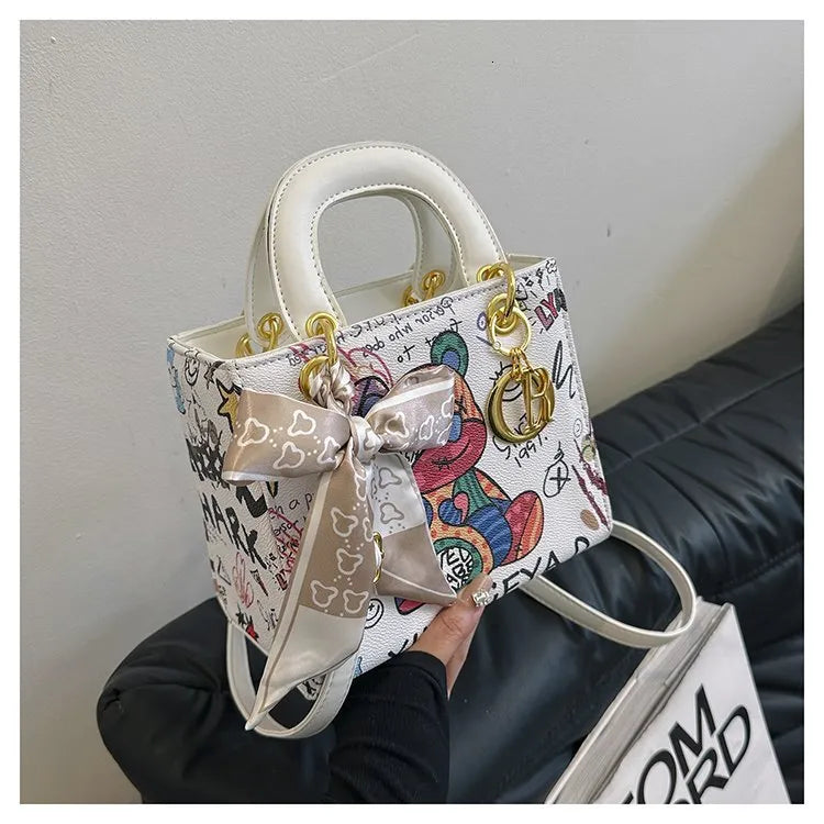 Imported Designer Crossbody Handbag with Graffiti Accent With Silk Scarf