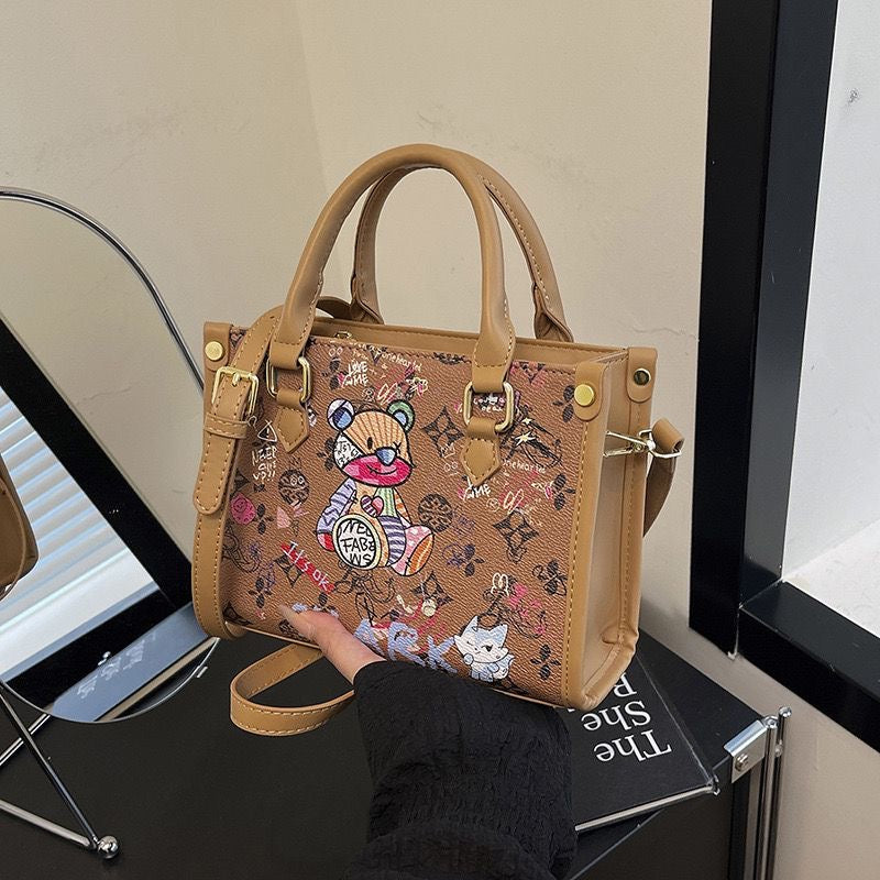 Imported Designer Crossbody Handbag with Graffiti Accent