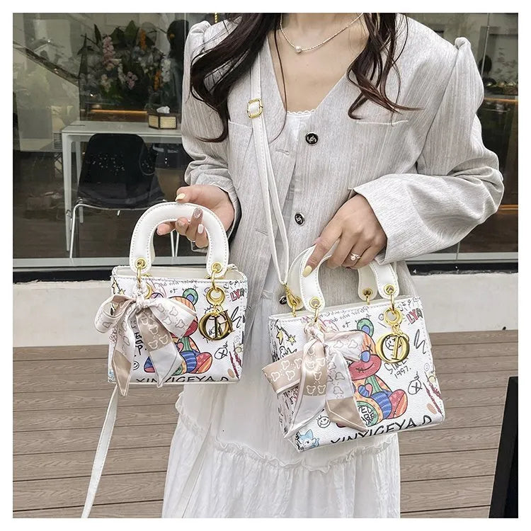 Imported Designer Crossbody Handbag with Graffiti Accent With Silk Scarf