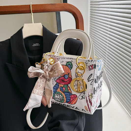 Imported Designer Crossbody Handbag with Graffiti Accent With Silk Scarf