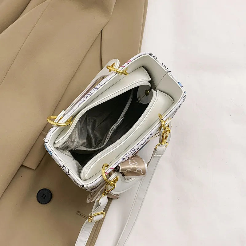 Imported Designer Crossbody Handbag with Graffiti Accent With Silk Scarf