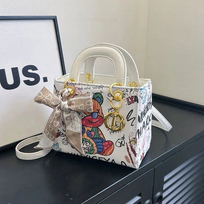 Imported Designer Crossbody Handbag with Graffiti Accent With Silk Scarf
