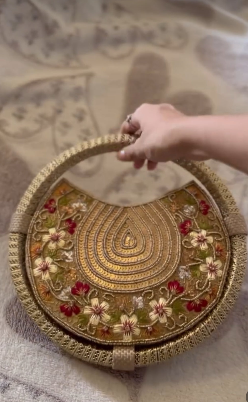 Women's Dull Gold embroidered whirl round partywear clutch bag