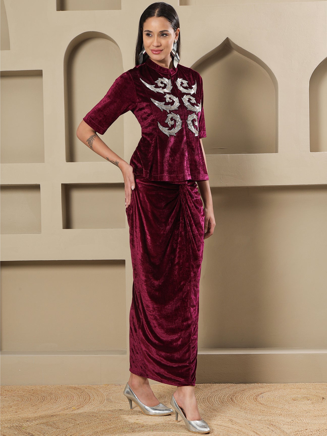 Designer Partywear Wine Velvet Hand-Embellished Top & Draped Knot Skirt Set