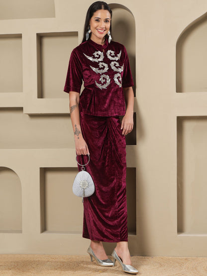 Designer Partywear Wine Velvet Hand-Embellished Top & Draped Knot Skirt Set