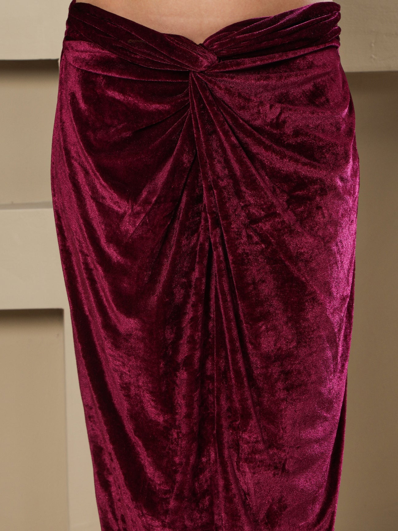 Designer Partywear Wine Velvet Hand-Embellished Top & Draped Knot Skirt Set