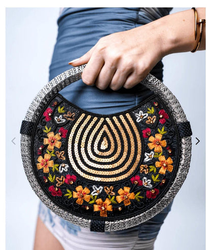 Women's Black & Gold embroidered whirl round partywear clutch bag