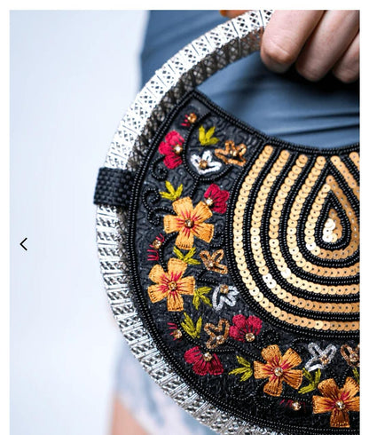 Women's Black & Gold embroidered whirl round partywear clutch bag