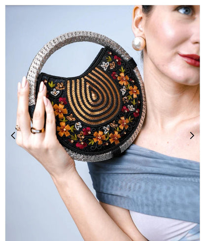 Women's Black & Gold embroidered whirl round partywear clutch bag