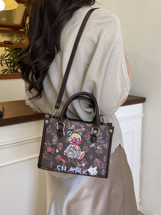 Imported Designer Crossbody Handbag with Graffiti Accent