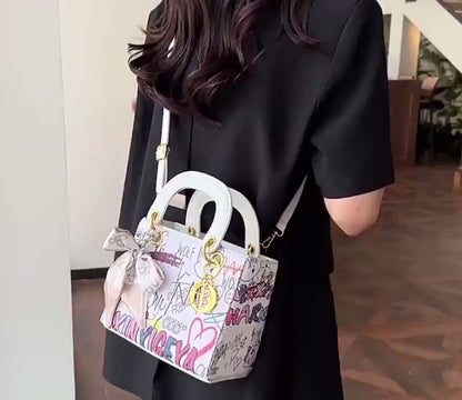 Imported Designer Crossbody Handbag with Graffiti Accent With Silk Scarf